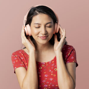 cheerful-woman-listening-to-music-with-a-headset-m-2021-09-02-06-04-58-utc